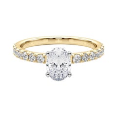 GIA 1,2ct Solitario ovale con mezza eternità in oro giallo 18 carati