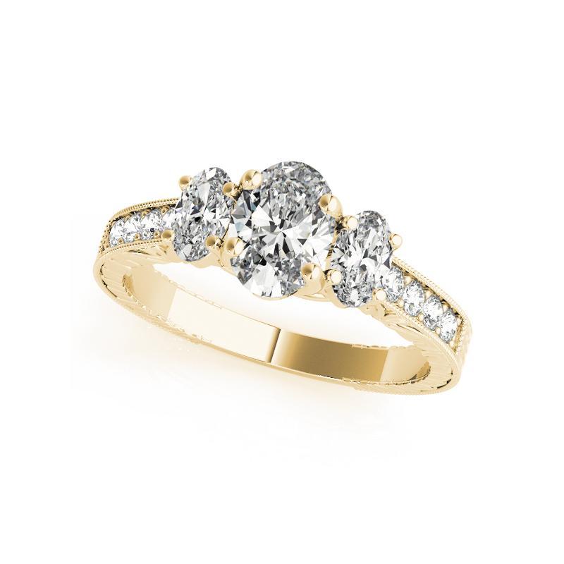 Taglio ovale GIA Anello con diamante ovale a tre pietre inciso su canale in oro giallo 18 carati da 1,2 carati in vendita