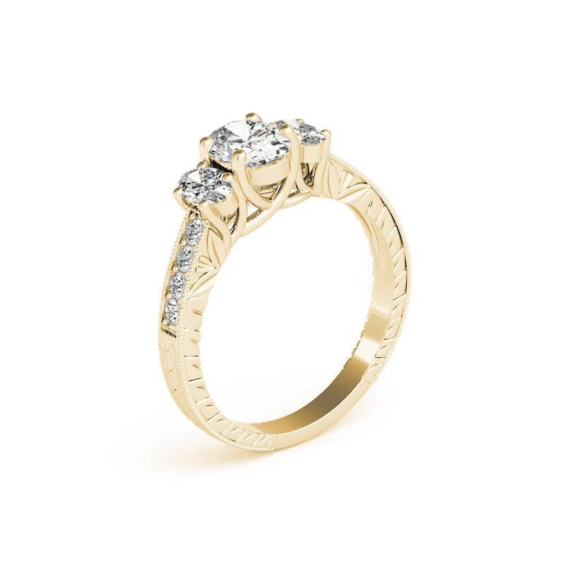 Donna GIA Anello con diamante ovale a tre pietre inciso su canale in oro giallo 18 carati da 1,2 carati in vendita