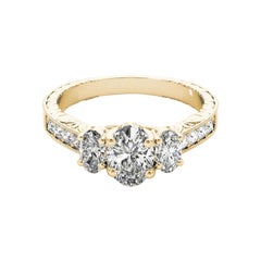 GIA Anello con diamante ovale a tre pietre inciso su canale in oro giallo 18 carati da 1,2 carati
