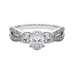 GIA 1.2ct Oval Three-Stone Split Shank Pave  Anello con diamante