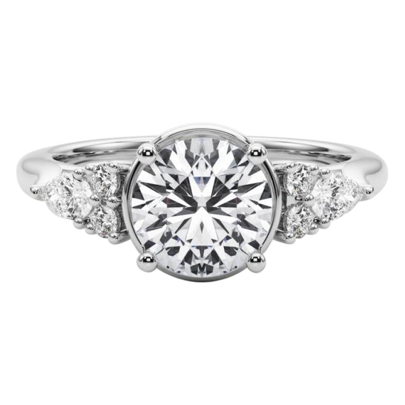GIA 1,2ct Anello con diamante rotondo a castone e fiore incastonato in oro bianco in vendita
