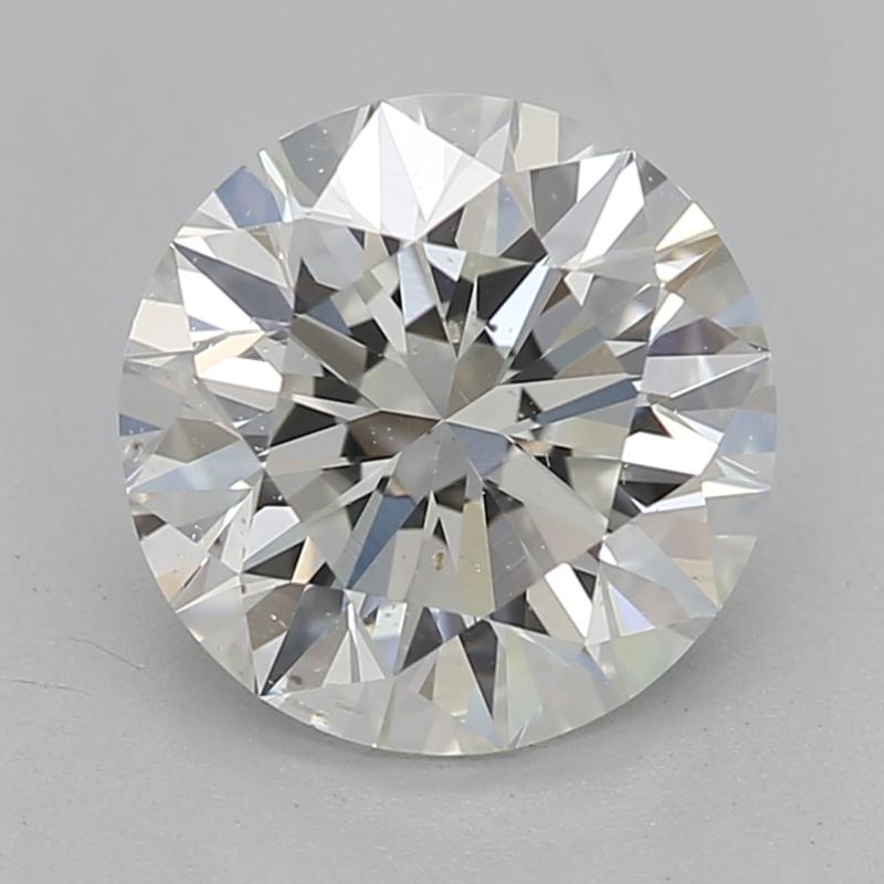 Dieser exquisite Diamantring wurde mit unvergleichlicher Kunstfertigkeit gefertigt und zeigt in der Mitte einen bemerkenswerten runden Diamanten mit einem Gewicht von 1,2 und einer Graduierung von I und SI1 (GIA-zertifiziert). Das auffällige Design