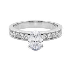 GIA Anello con diamante ovale vintage da 1,3 carati con canale a grana grossa in oro bianco 18 carati