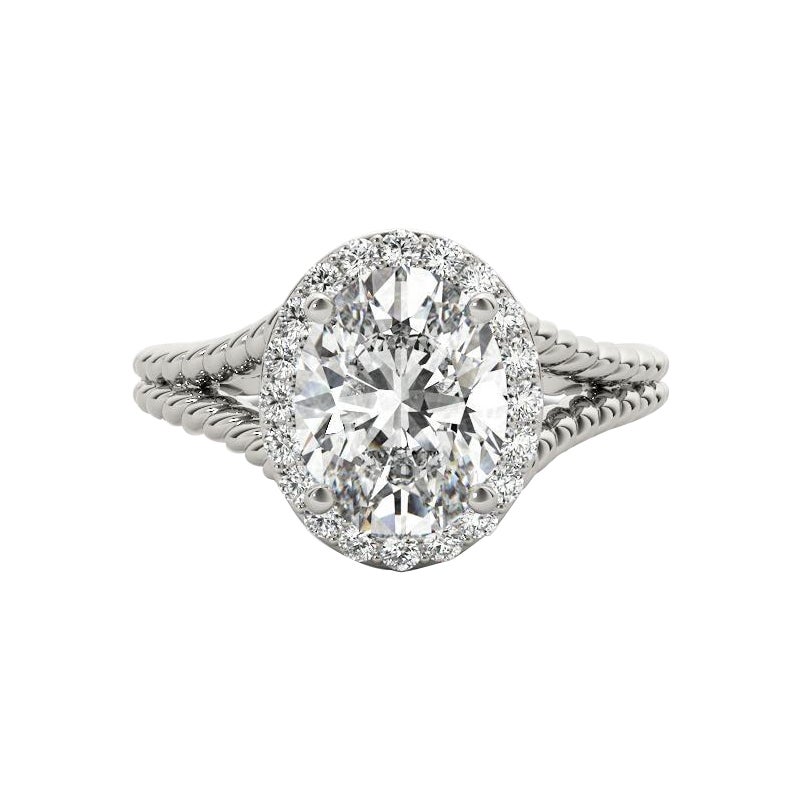 GIA 1,3 Carati Corda ritorta Split Shank Anello con diamante ovale aureolato in oro bianco 18K in vendita