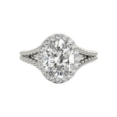 GIA 1,3 Carati Corda ritorta Split Shank Anello con diamante ovale aureolato in oro bianco 18K