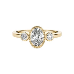 GIA Anello con tre pietre in oro giallo 18 carati con castone ovale da 1,30 carati