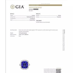GIA 13.07cts Tanzanite in Diamond Halo Platinum Ring