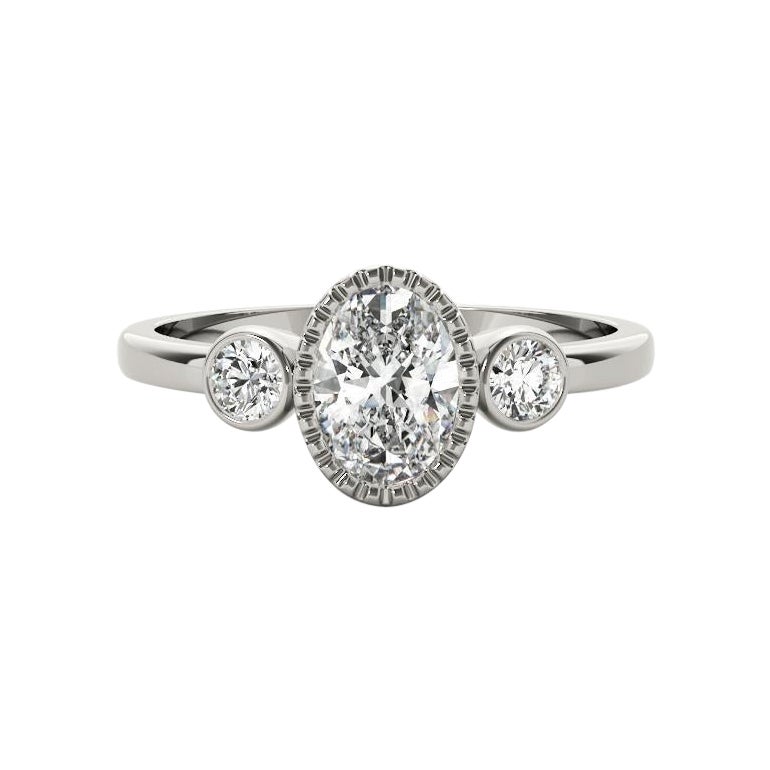 GIA 1,31 Carati Oval Textured Bezel Three-Stone Anello con diamanti in oro bianco 18K