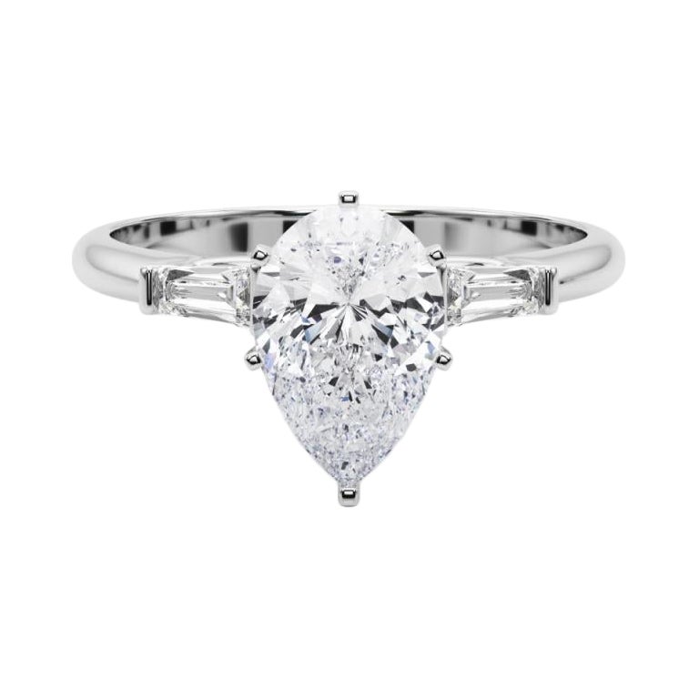 GIA 1.31ct Pear Three-Stone Tapered Baguette 18K White Gold Diamond Ring (bague à diamants en or blanc)