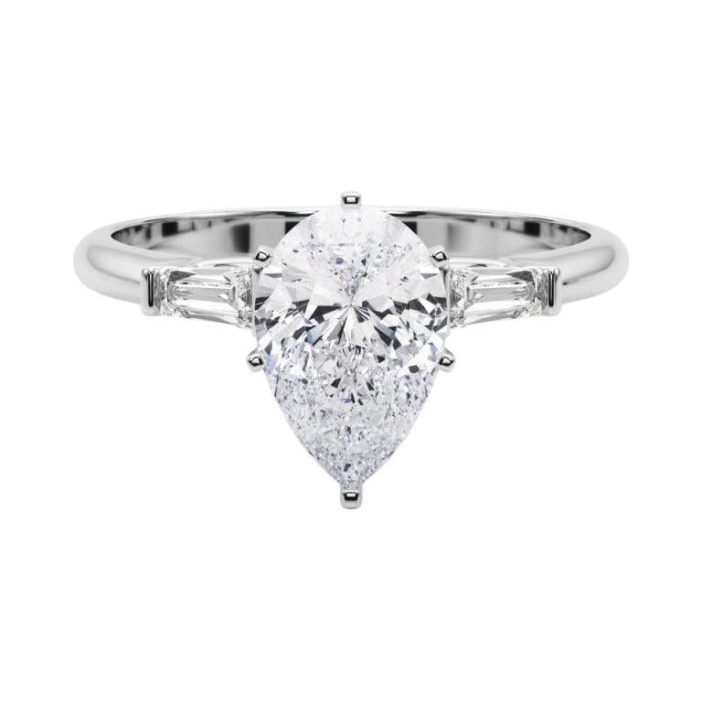 GIA 1.3ct Pear Three-Stone Tapered Baguette Bague en diamant