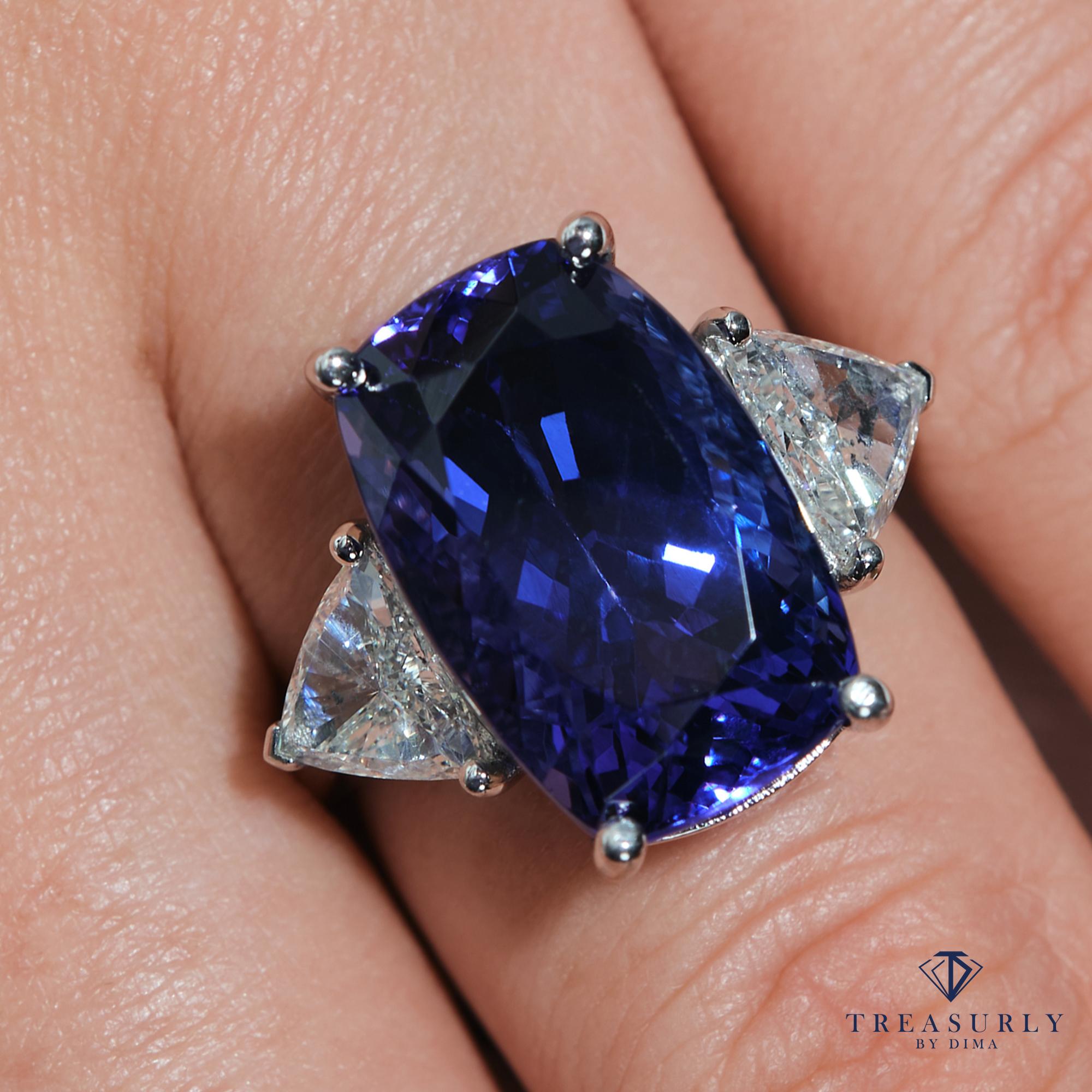 AN EXQUISITE CUSHION TANZANITE & TRILLION DIAMONDS THREE STONE PLATINUM RING. 

A HUGE and BEAUTIFUL ring to own!  SUPER Fine Tanzanite is one of the most beautiful gemstone in the treasure of Mother Nature. 
A RARE opportunity to own a nice