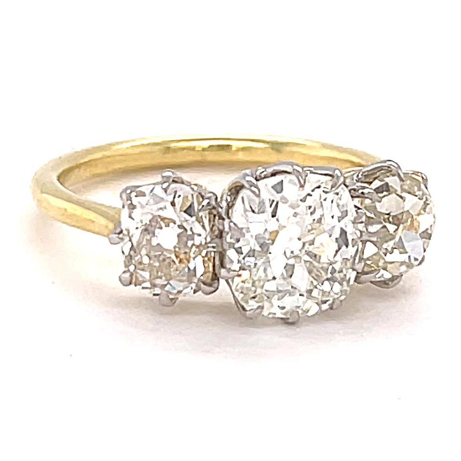 Women's or Men's GIA 1.46 Carat Old Mine Cut Diamond 18 Karat Gold Three Stone Ring