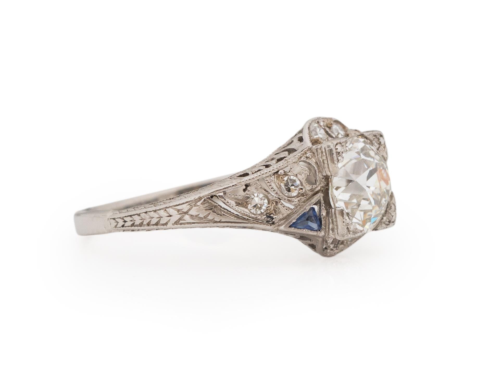 Ring Size: 7.25
Metal Type: Platinum [Hallmarked, and Tested]
Weight: 3.0 grams

Center Diamond Details:
GIA REPORT #: 2223203932
Weight: 1.48ct
Cut: Old European brilliant
Color: I
Clarity: VS2
Measurements: 7.11mm x 6.92mm x 4.80mm

Side Stone