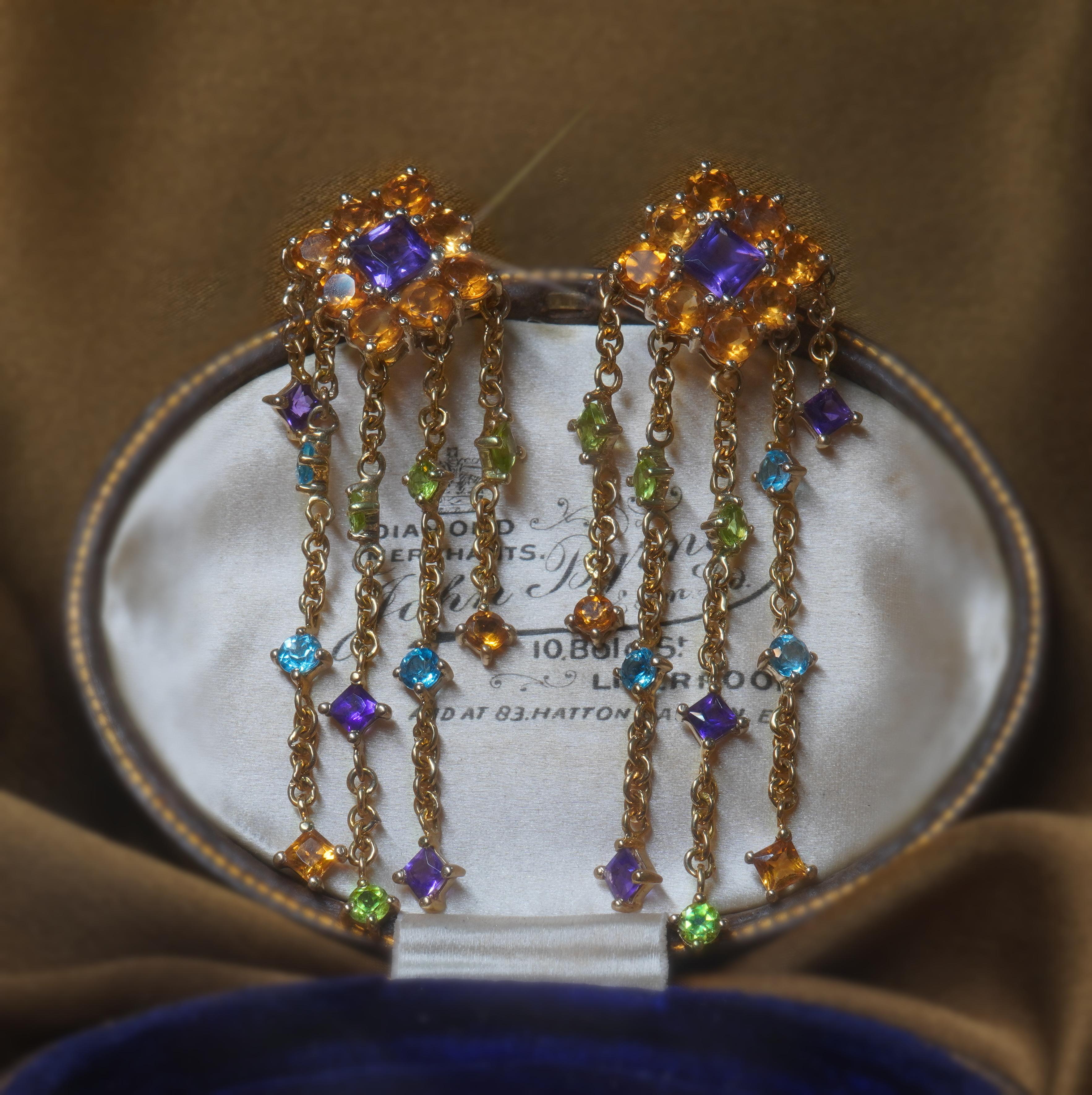 Old South Jewels proudly presents...GIA CERTIFIED FINE 8.52 CARATS VINTAGE EARRINGS AMETHYST, PERIDOT, TOPAZ, AND CITRINE.  FINE SPARKLING EARTH-MINED VINTAGE GEMSTONES IN SOLID 14K GOLD DANGLING LONG STATEMENT EARRINGS

GIA certification Paperwork