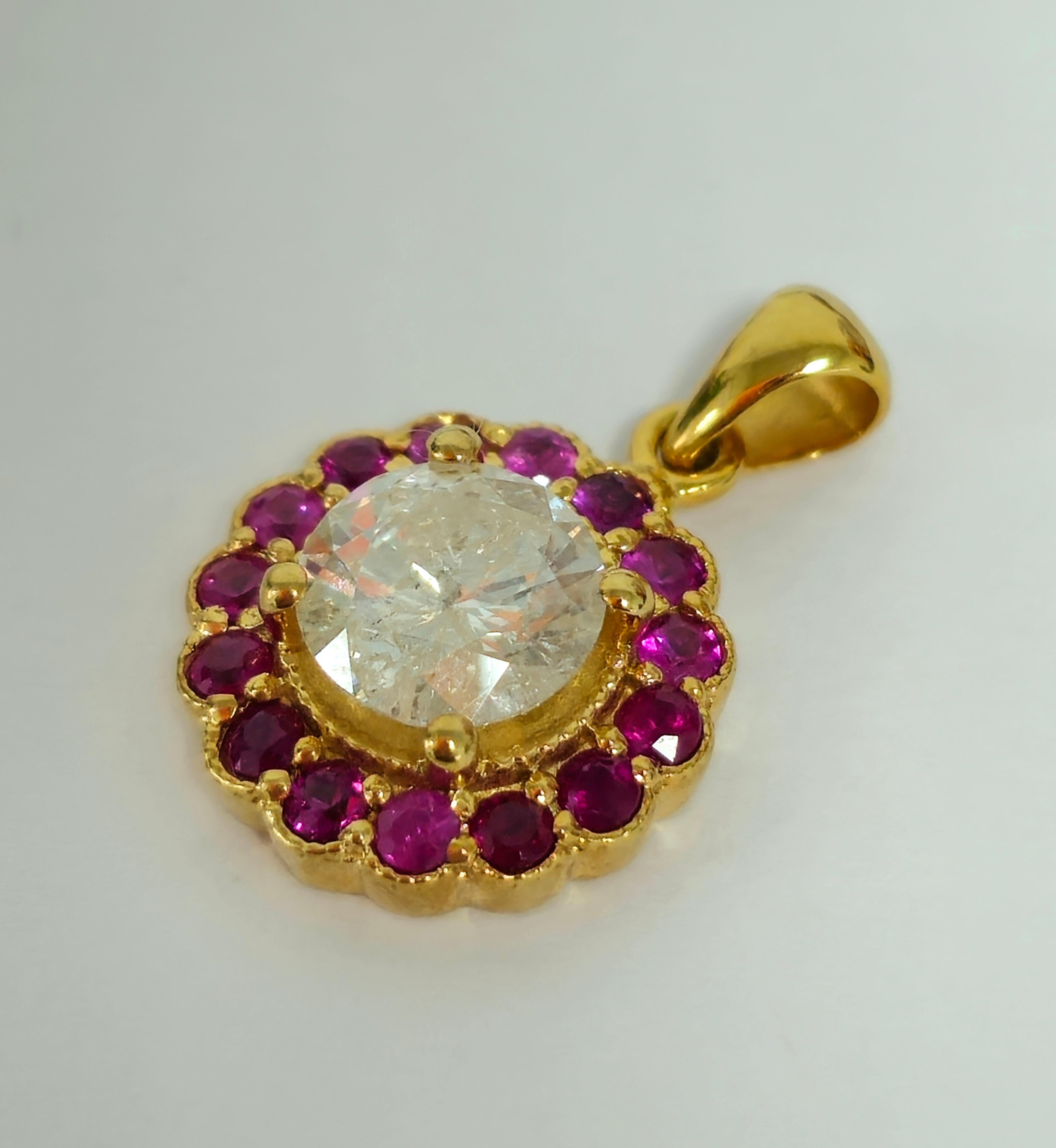 Adorn yourself with sophistication with this 14K yellow gold ring, featuring a striking 1.51 carat natural diamond at its center, complemented by 0.60 carats of natural Burma rubies on the sides, resulting in a total carat weight of 2.11 carats.