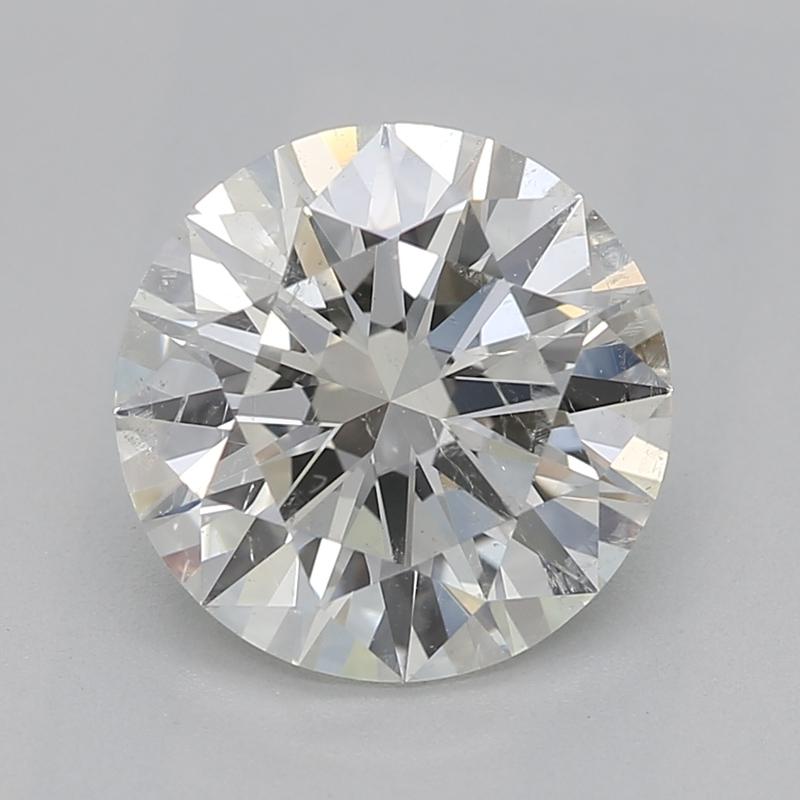 Handcrafted in New York, this exquisite diamond ring features a breathtaking centerpiece of a round diamond boasting an impressive 1.5 weight, meticulously graded at J and SI2. Set within a modern framework of platinum , the brilliance of the