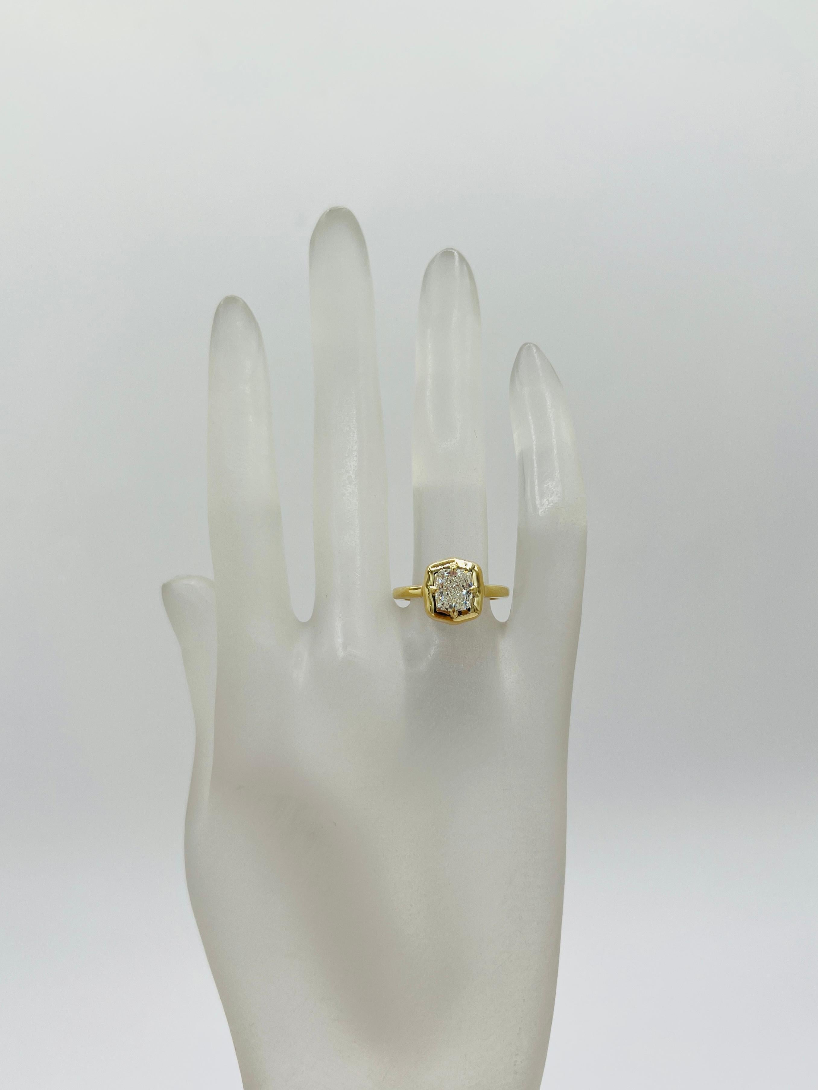 Beautiful 1.53 ct. H SI1 white diamond cushion.  Handmade in 14k yellow gold.  Ring size 6.75.  Comes with GIA certificate.