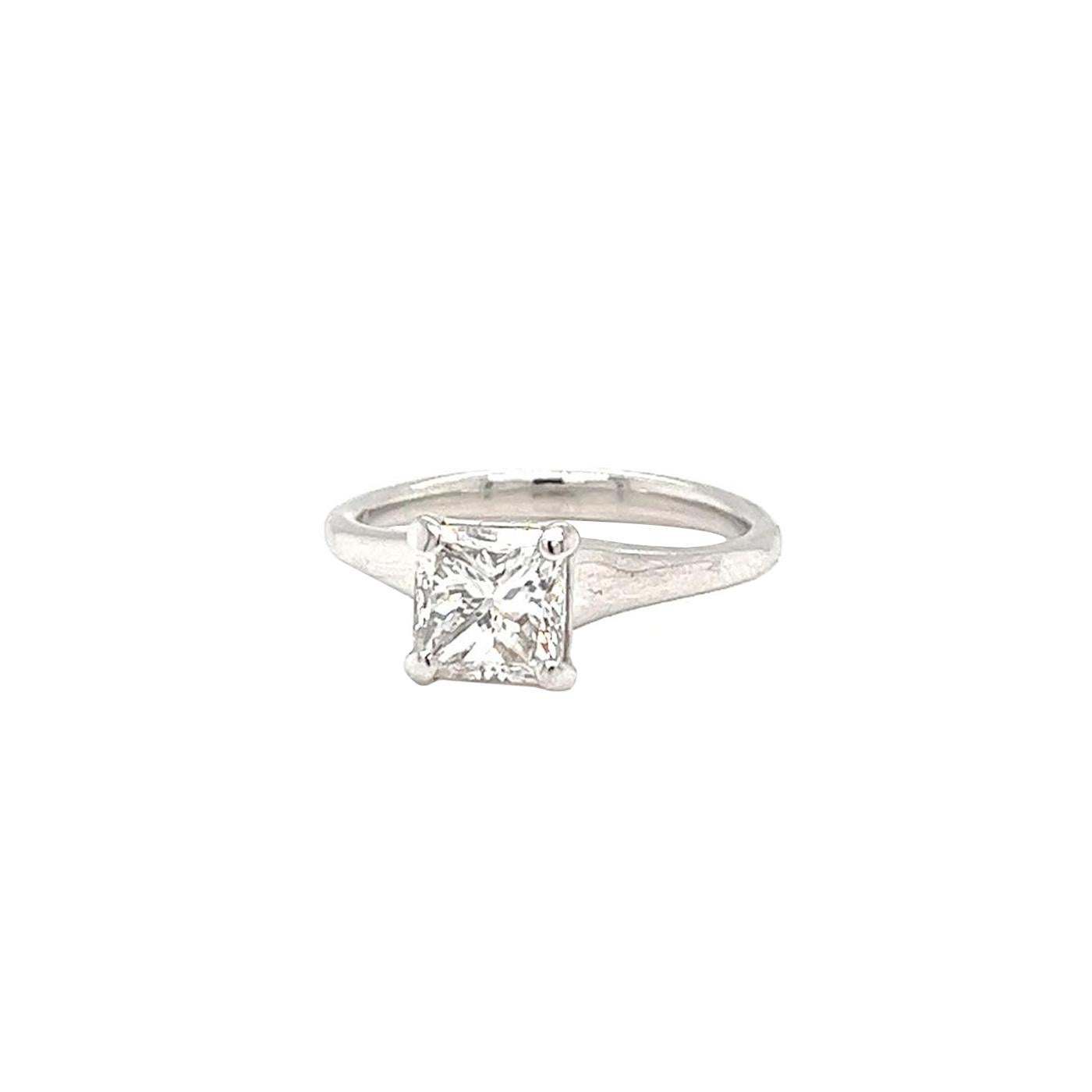 A Platinum Diamond Ring. Features a GIA-graded Center Natural Princess Cut Fancy 1.50ct Diamond Ring with measurement of (6.33 x 6.24 x 4.66 mm), VS2 Clarity and H in Colour with a Very Good Polish Finish, A natural timeless when wearing this