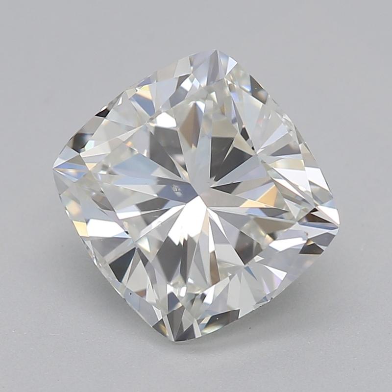 Handcrafted in New York, this stunning diamond ring features a captivating cushion diamond at the center, weighing 1.51 and exhibiting a pristine H and SI1. The design showcases a beautifully crafted cushion/square halo adorned with round brilliant