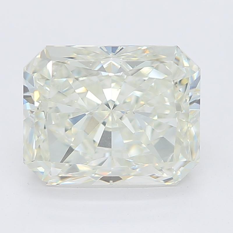 An elegantly designed diamond ring that exudes vintage charm and modern sophistication. Crafted from platinum , this ring features a stunning center stone in a breathtaking radiant cut. Weighing an impressive 1.51 , the diamond boasts a radiant J