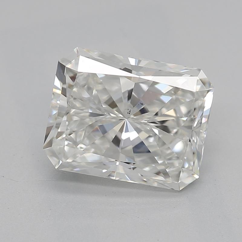 Elevate your jewelry collection with this stunning diamond ring, featuring a captivating radiant center stone weighing 1.51 and graded H with VS2. The meticulously crafted raised basket setting showcases the brilliance of the diamond, elegantly