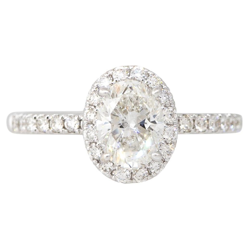 GIA 1.54 Carats Oval Cut Diamond Halo Engagement Ring 18 Karat In Stock For Sale