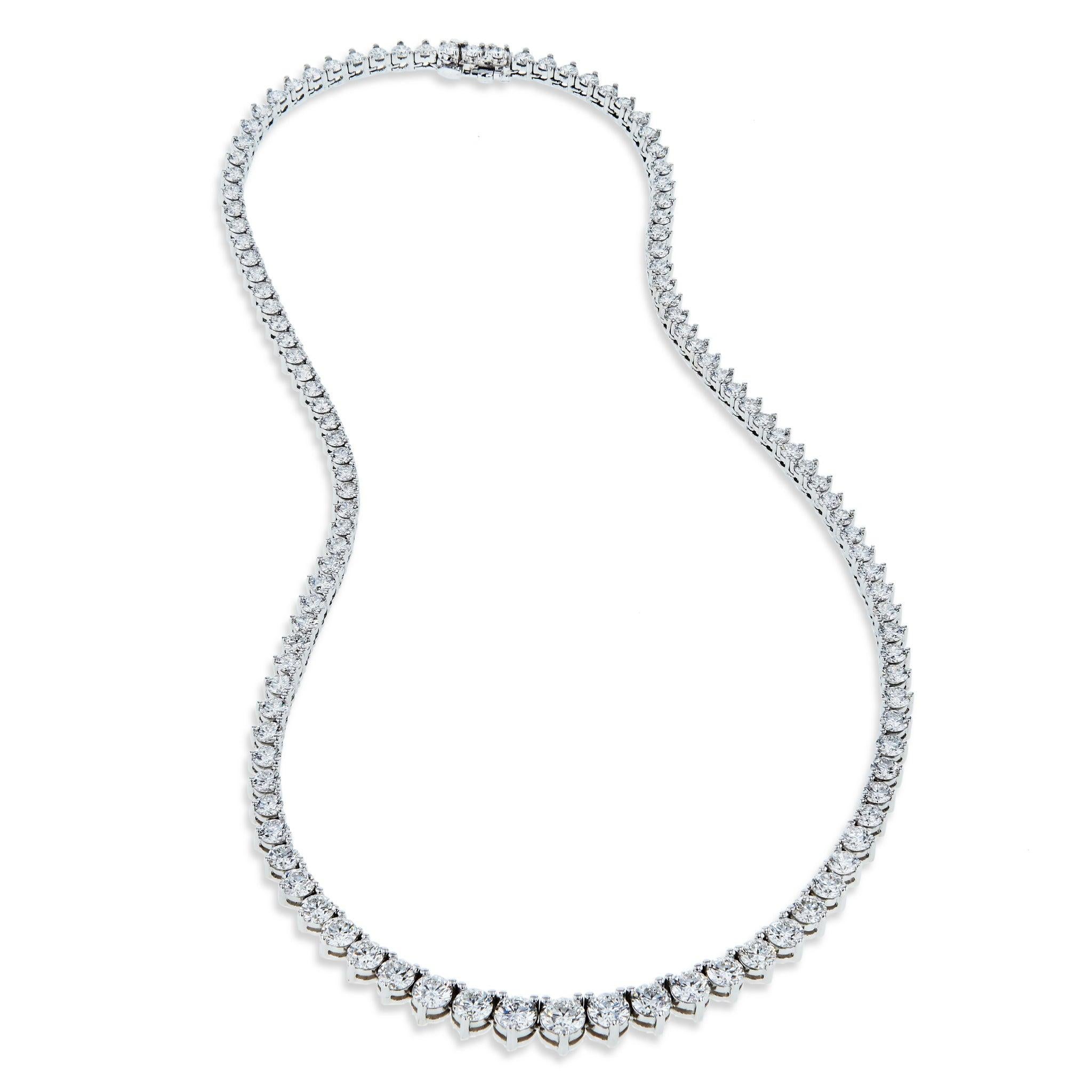 Diese wunderschöne Riviera-Halskette besteht aus 15,44 Karat schillernden Diamanten im Brillantschliff mit der Farbe F/G und der Reinheit VS1/SI1 (EX, VG-Schliff). 

Diese atemberaubende Halskette nimmt zur Mitte hin, wo sich die größten Steine
