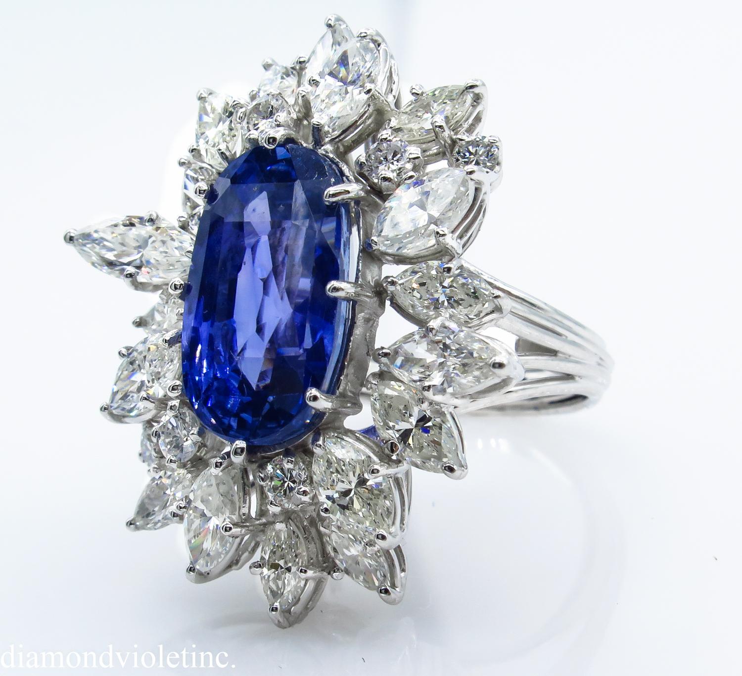 An Amazing Engagement Anniversary Cluster Handmade PLATINUM (stamped) Ring with GIA Certified 10.59CT NATURAL Ceylon Oval shaped Violetish Blue Sapphire; with measurements of 14.77x8.87x7.57mm. Gorgeous Dark Cornflower True Sky Blue color!! NO