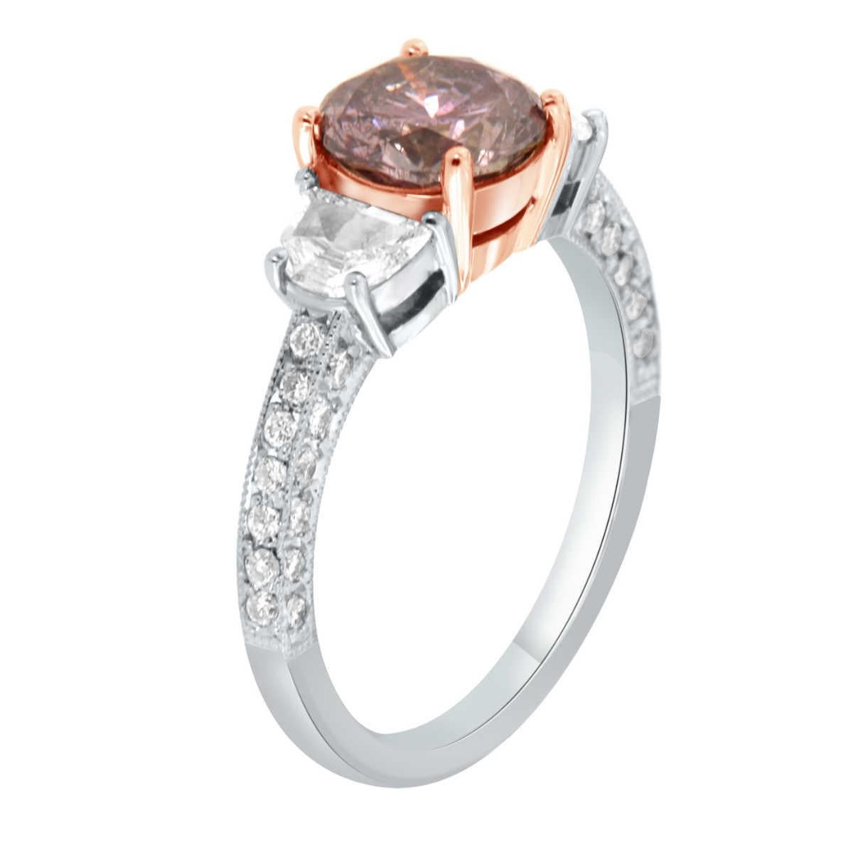 This 14K Two-Tone handcrafted Women's trilogy ring showcases a  Rare 1.55 Carat GIA Certified Natural Vibrant Fancy Brownish Pinkish-Purple Round Brilliant Cut diamond accompanied by two (2) Half. Moon Cut diamonds on each side, along with a melee