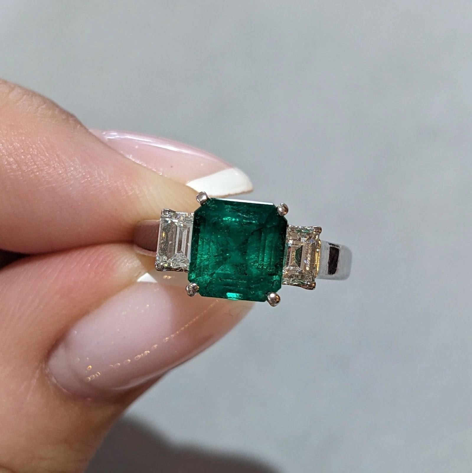 GIA 1.56 ct Colombian Emerald and Diamond Ring in Platinum

Emerald and Diamond Ring features a GIA certified Colombian Emerald accented by Baguette Diamonds on the sides, all set in a Platinum Three-Stone setting.

Total emerald weight is 1.56