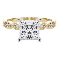 GIA 1,5ct Principessa Marquise e Anello rotondo con castone di diamanti in oro giallo