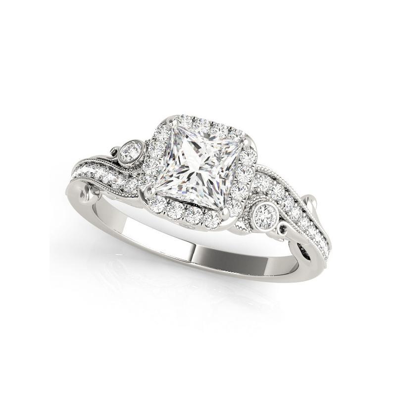 **Save this ring ❤️ to receive price updates**
A splendid diamond ring that captures the essence of classic elegance, the centerpiece is a captivating princess diamond weighing 1.5, graded G and SI2 by GIA, ensuring not only brilliance but also