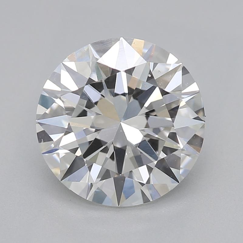Fabricado a mano en Nueva York, este exquisito anillo de diamantes tiene como pieza central un diamante redondo certificado por el GIA que pesa 1,5 y exhibe un prístino G y SI1. El elegante engaste en garras acentúa el brillo y el fuego