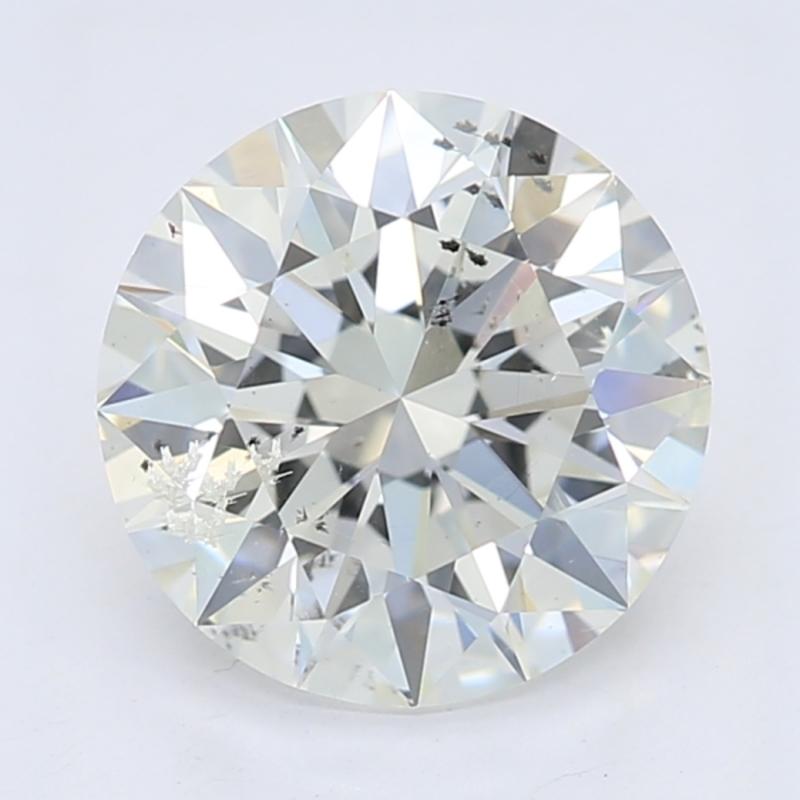 Fabriquée avec un souci exceptionnel du détail, cette bague en diamant exquise présente un magnifique diamant rond en serti clos d'un poids remarquable de 1.5. La pierre centrale magnifiquement classée H et SI2 assure un éclat exquis qui capture