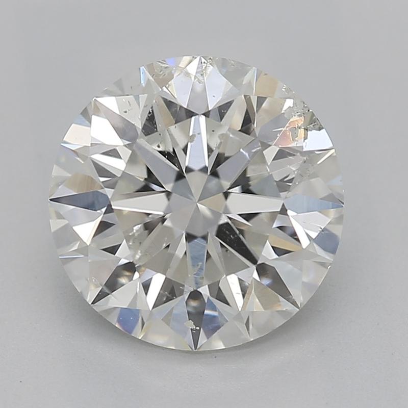 Handcrafted in New York, this stunning diamond ring features a captivating center stone composed of a round diamond weighing 1.60 , rated I and SI2. The ring is meticulously crafted in luxurious yellow gold , accentuated by an elegant curved bypass
