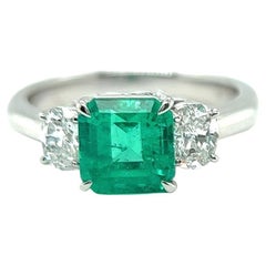GIA 1.61 Carats Colombian Emerald Diamond Platinum Three Stone Ring