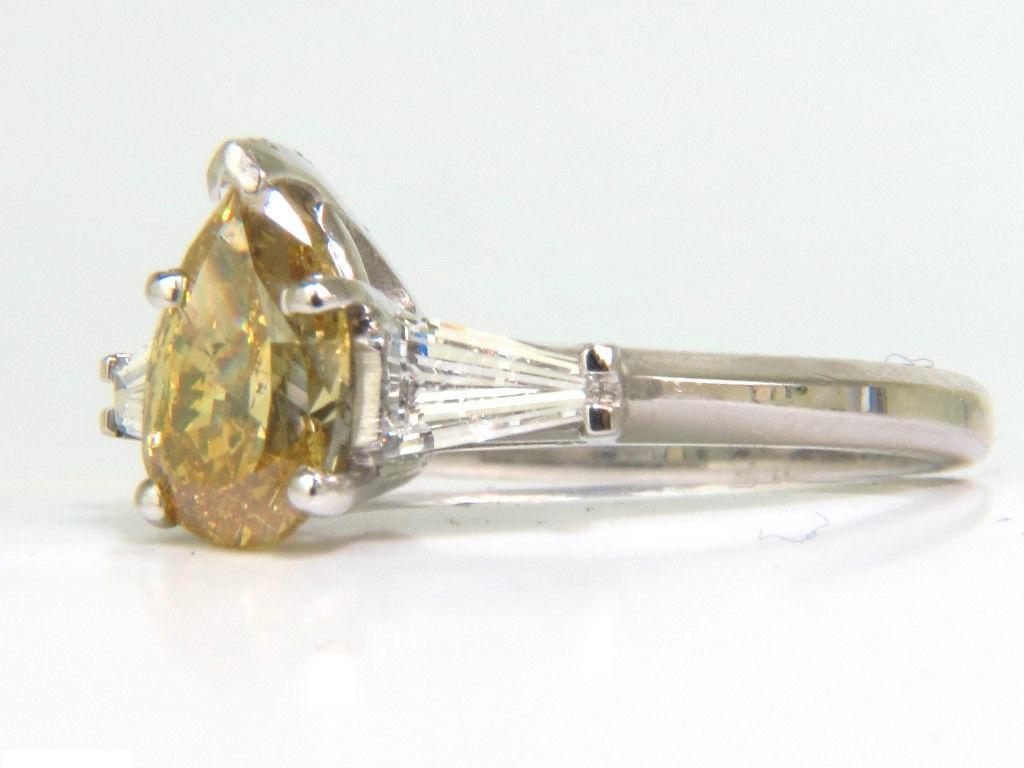 GIA 1.62 Carat Natural Fancy Yellow Diamond Ring Vivid and Clean For Sale 3