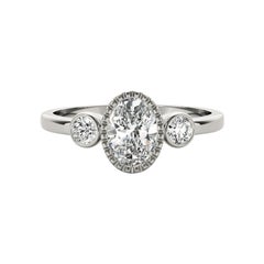 GIA 1.7 Carati Ovale con Lunetta Testurizzata a Tre Pietre  Anello con diamante