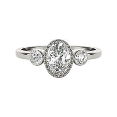 GIA 1.70 Carat Oval Textured Bezel Three-Stone  Diamond Ring