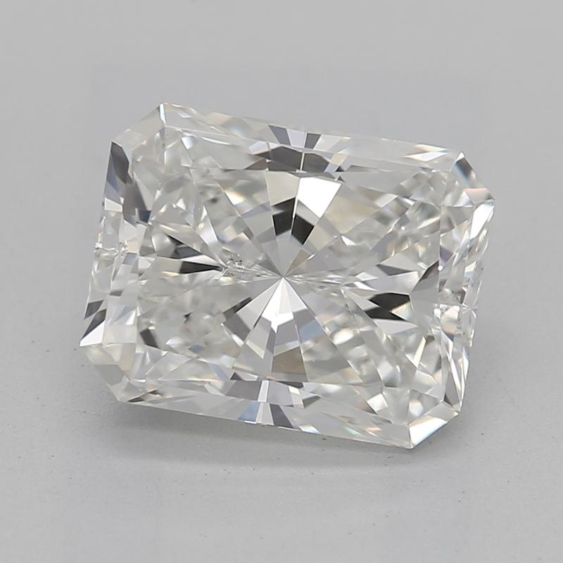 Behold a stunning diamond ring that epitomizes elegance and sophistication. At its heart lies a mesmerizing radiant diamond weighing 1.70 , masterfully graded G and SI1. This ring captures the light beautifully, creating a splendid dance of