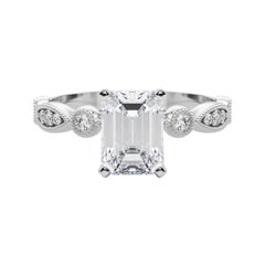 GIA 1,70ct Smeraldo Marquise e castone rotondo con diamanti in oro bianco