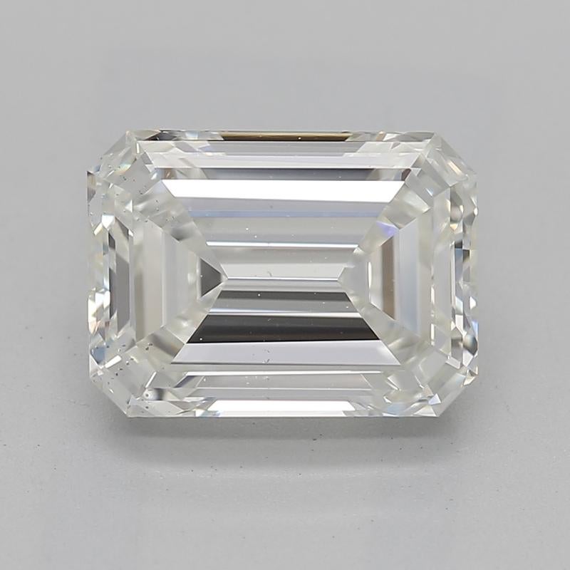 Elevate your collection with This exquisite diamond ring featuring a captivating emerald J SI1 1.70 center stone, securely embraced in a sophisticated four-prong setting. The elegantly designed band, crafted from luxurious white gold , is