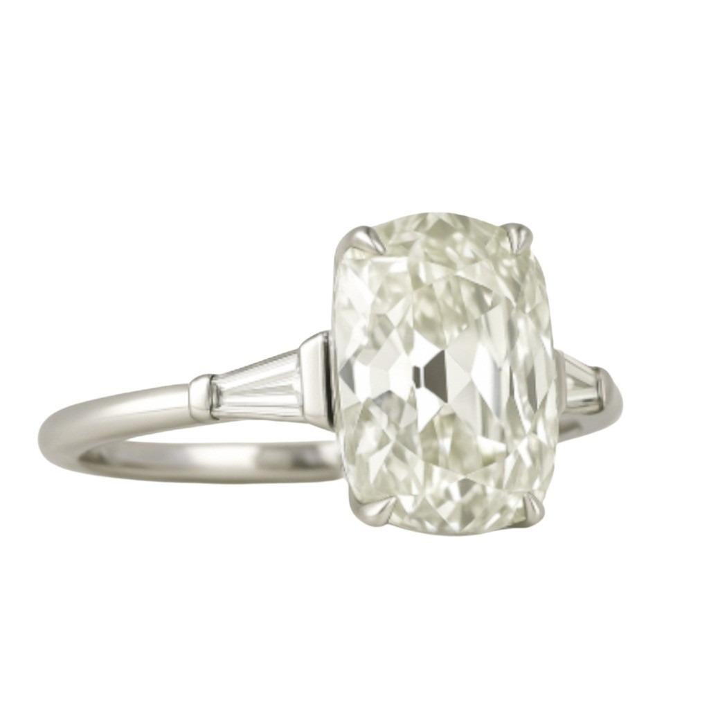A refined take on antique elegance, this handcrafted engagement ring features a GIA-certified 1.70 carat Old Mine Brilliant cut diamond, showcasing the unmistakable charm of 19th-century faceting. With its elongated cushion shape, visible culet, and