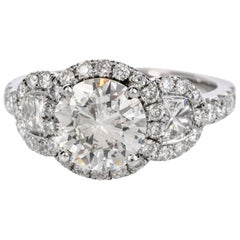 GIA 1.72 Carat Round Diamond 18 Karat Gold 3-Stone Halo Engagement Ring