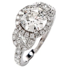 GIA 1.72 Carat Round Diamond 18 Karat Gold 3-Stone Halo Engagement Ring