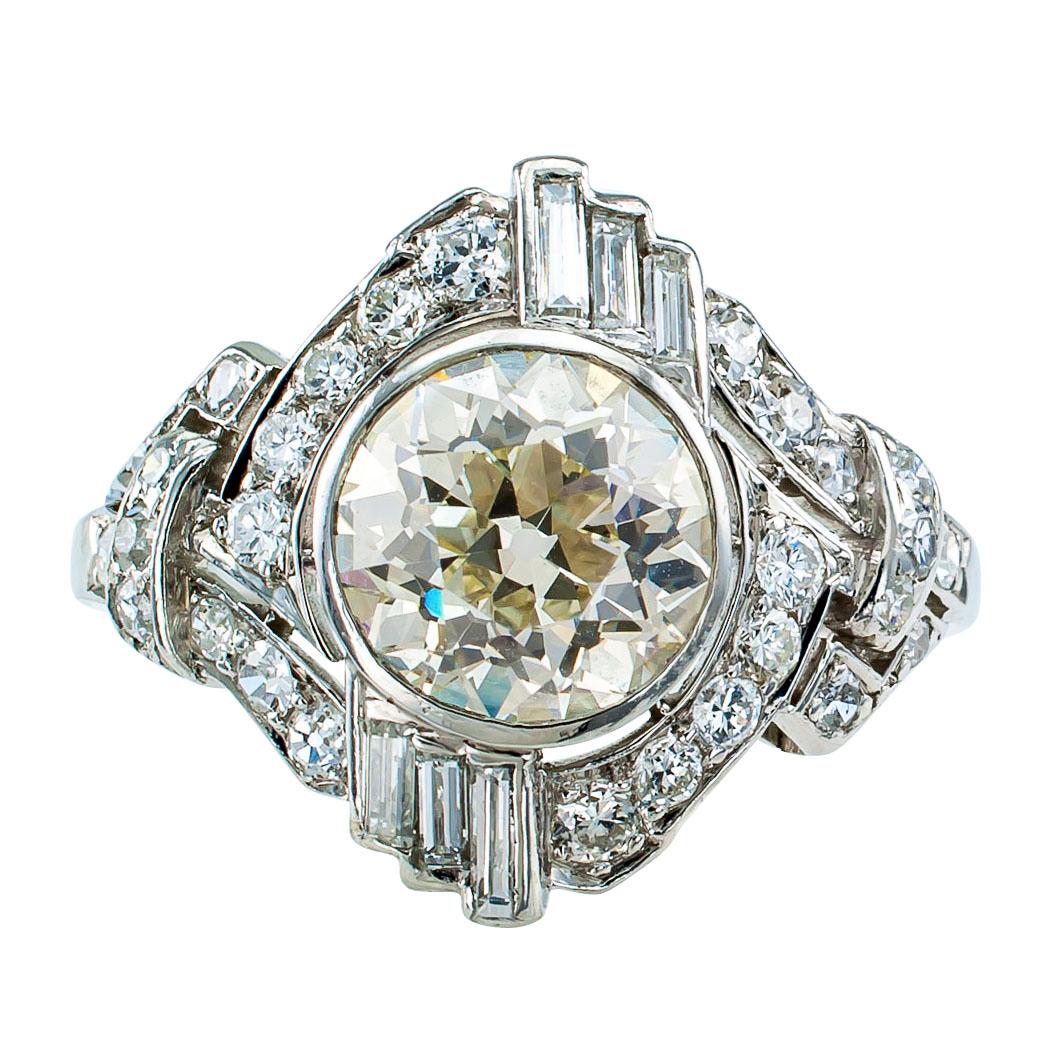 GIA 1.77 carats diamond and platinum Art Deco engagement ring circa 1930. The geometrically inspired design centers upon an old European-cut diamond weighing 1.77 carats, accompanied by a report from GIA stating that the diamond is M color and VS1