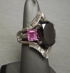 GIA 17.80 Carat Black Diamond and Pink Sapphire Ring