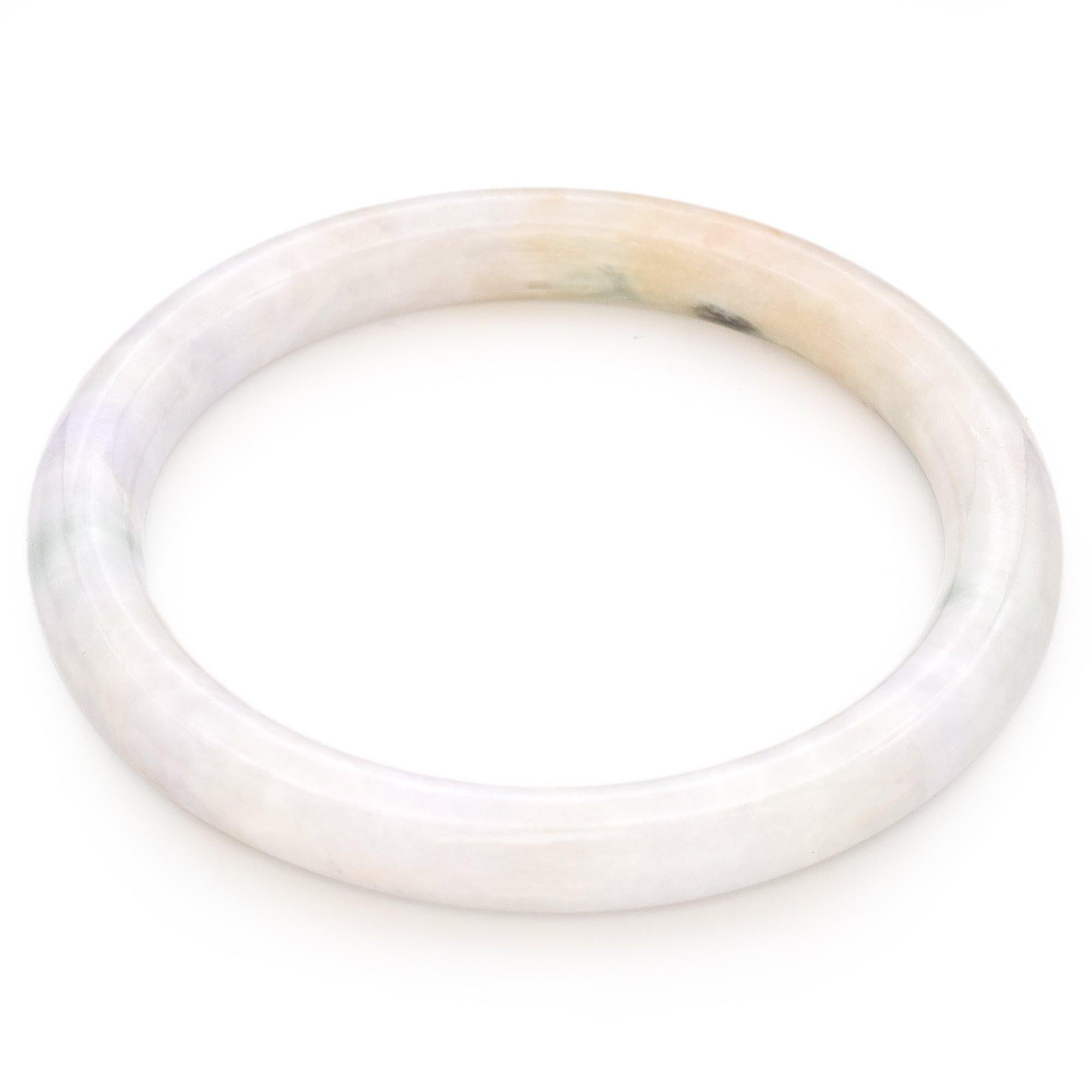 Weight:178.75 carats
Measurements:72.24X8.5 mm
Shape:Bangle Bracelet
Transparency:Translucent
Color:Mottled Light Gray
Item Description:One loose carving
Species:Jadeite Jade
Type:A
Bracelet Size:7 Inches

Item #:BR-1259-042324-06