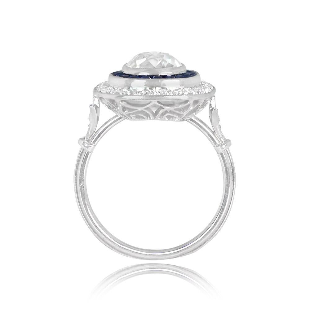 Presenting an exquisite double halo diamond engagement ring, gracing the center with a bezel-set 1.78-carat antique cushion cut diamond of K color and SI1 clarity, GIA-certified for authenticity. This captivating diamond is a true testament to